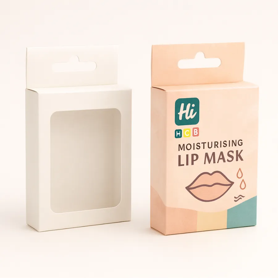 A white windowed box and a colourful peach box with a large lip graphic- class=